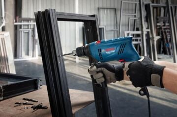 Bosch GSB 600 Darbeli Matkap + 100 Parça Aksesuar